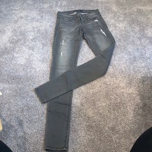 Gray distressed skinny jeans